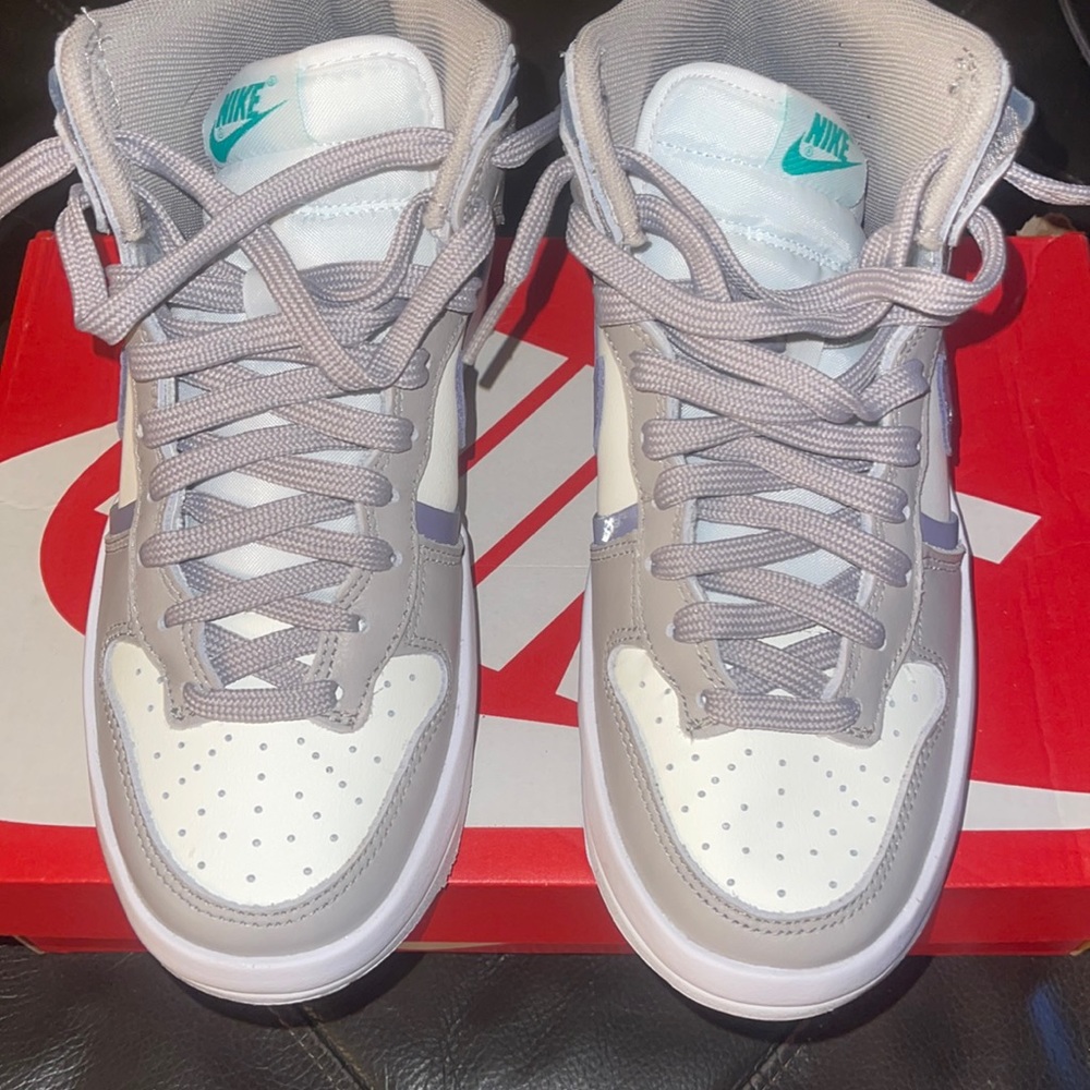 Nike woman’s dunk high up size 6 white, purple and grey. Slightly used